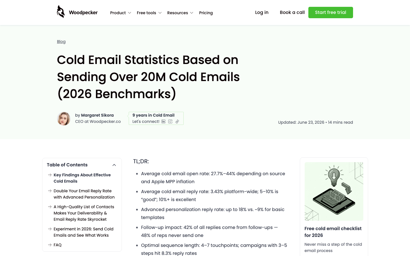 Woodpecker blog page showing 2026 cold email reply rate and personalization benchmark statistics.